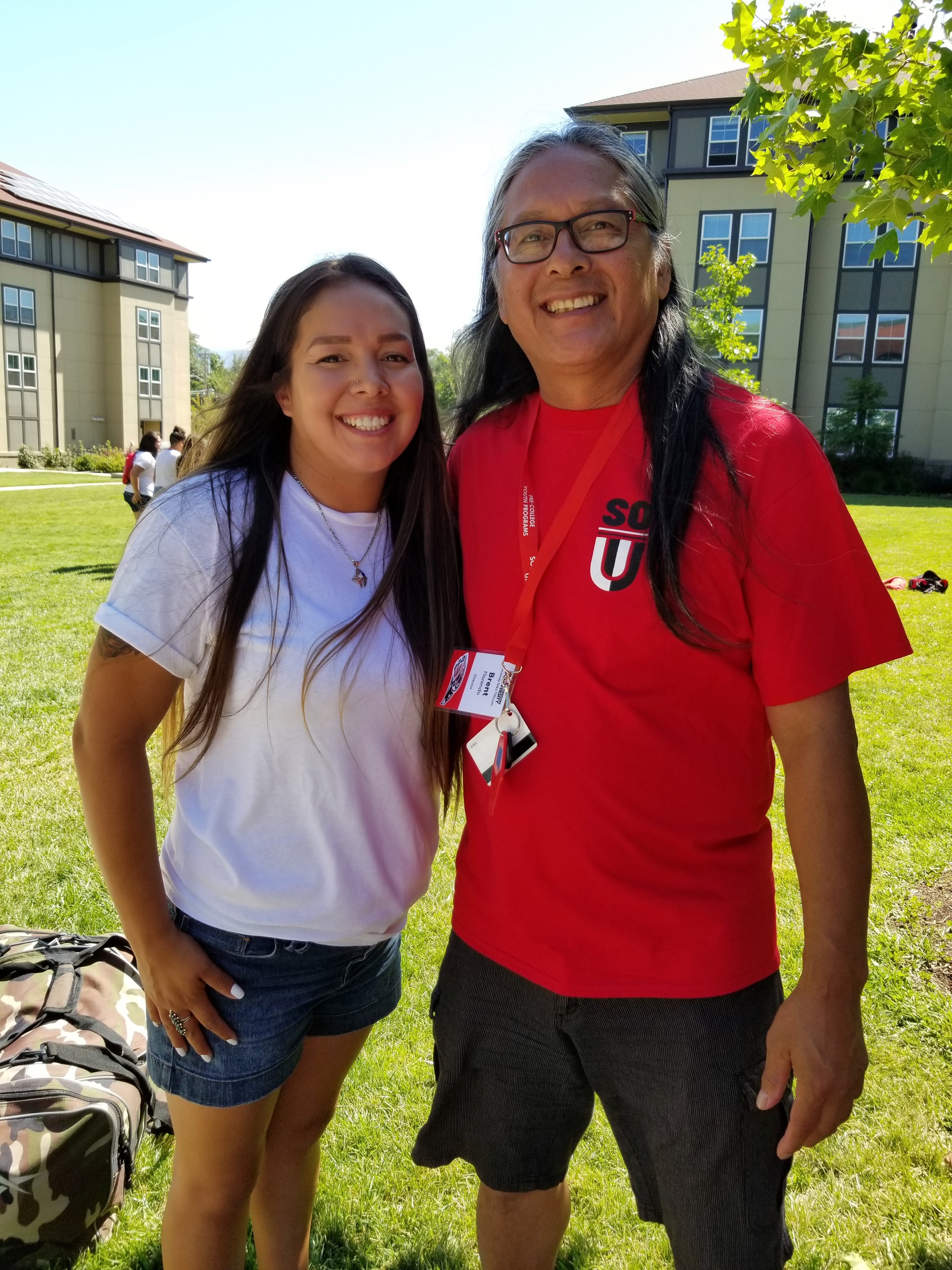 Brent Florendo and a student smiling in 2019
